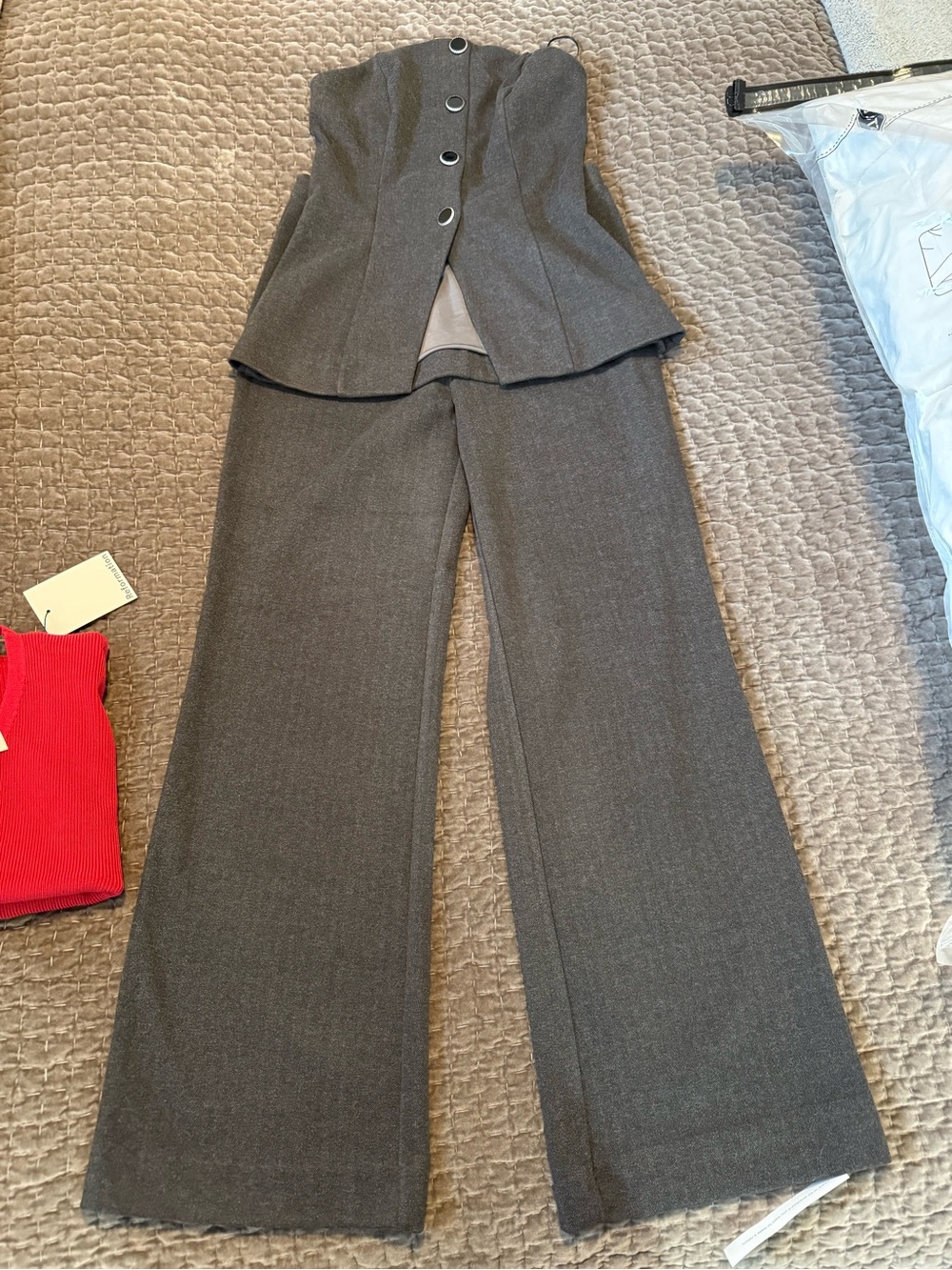 Reformation Charcoal Gray Strapless Button-Front Bustier Top and pants.